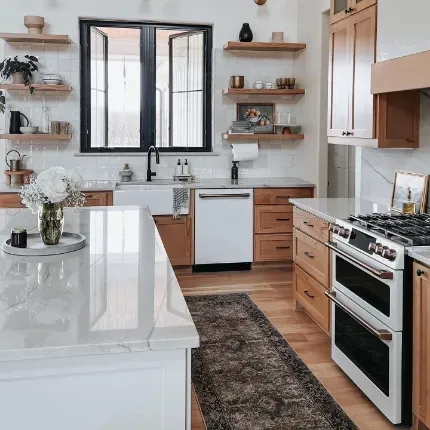 traditional kitchen layout with medium brown cabintry